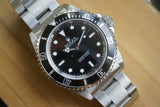 1999 Rolex Submariner 14060 with Paper and service card